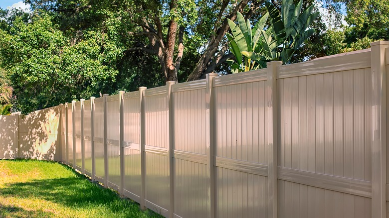 white vinyl fence in yard