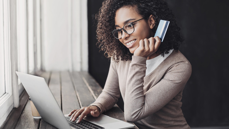 Woman making online purchase