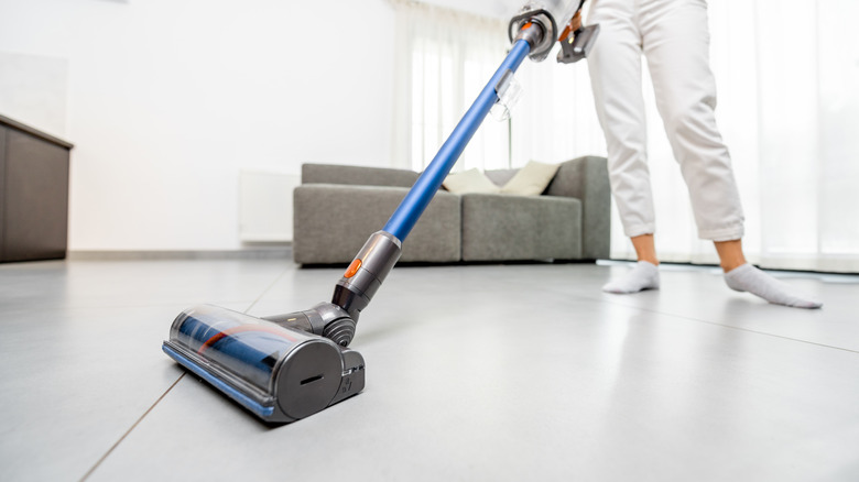 Vacuuming white tile floors