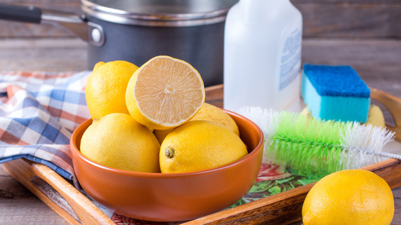 lemons and other cleaning tools