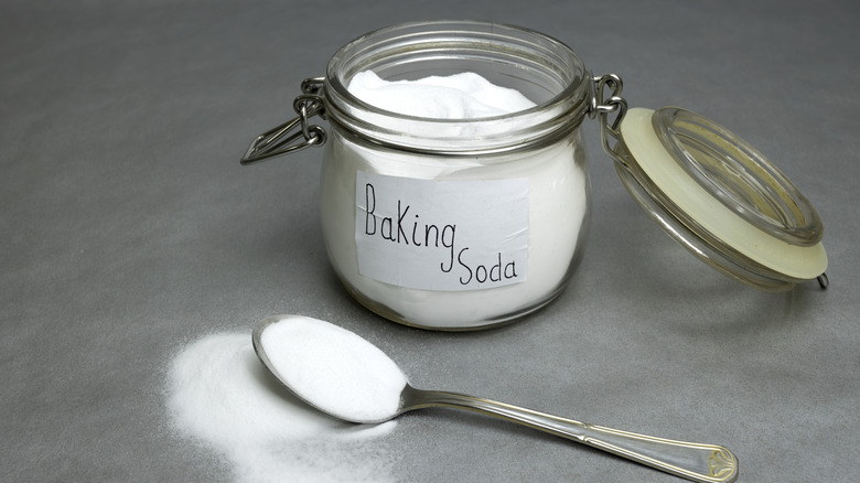 baking soda isolated on gray background