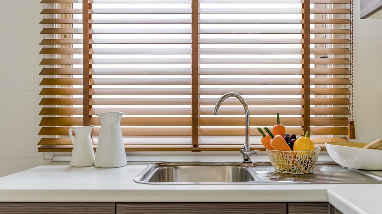 wood blinds in a kitchen