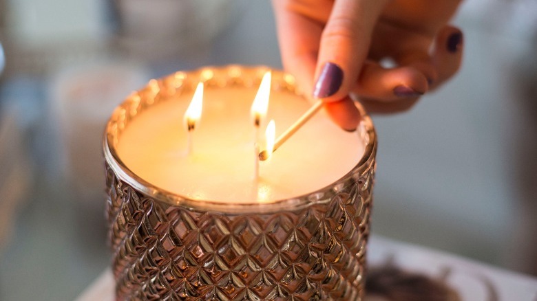 Close up lighting gold candle