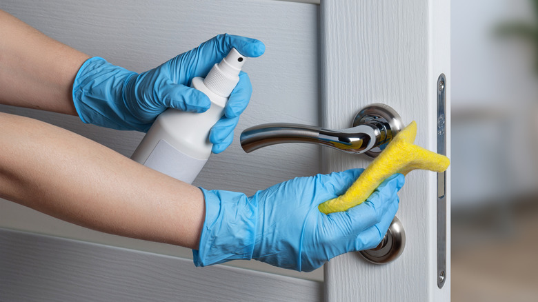 cleaning a door lock