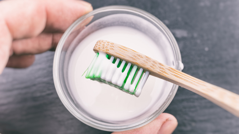 Toothbrush with baking soda paste