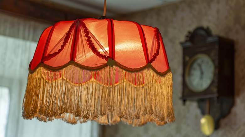 Vintage red lampshade with gold tassels