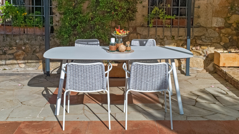 Aluminium table and chairs in a garden 