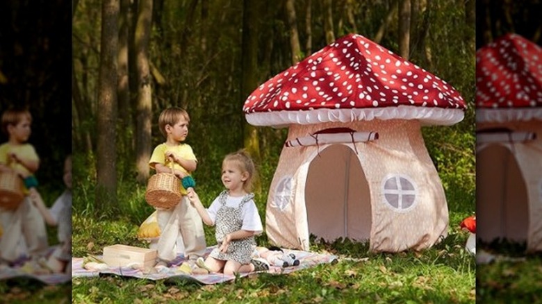 children with a mushroom tent