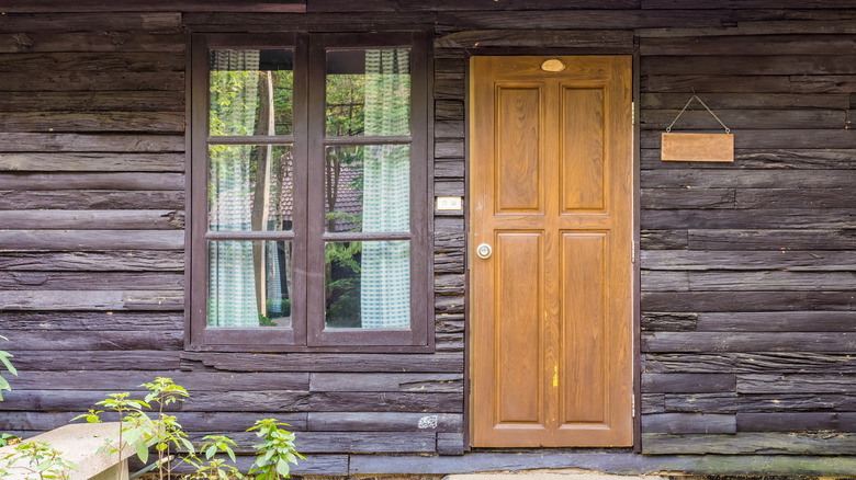 cabin with curtains in window