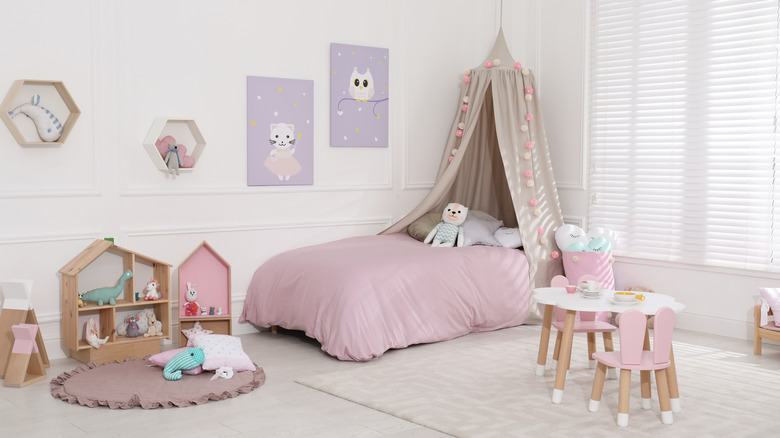 child's bedroom with pink bed