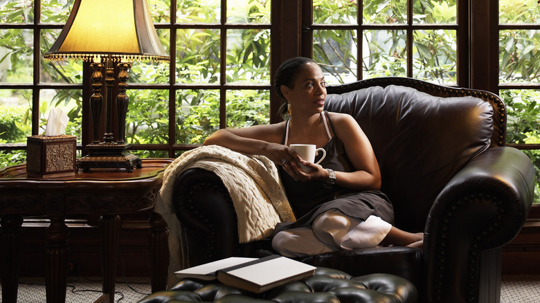 woman sitting in an armchair