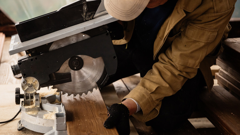 man using a circular saw