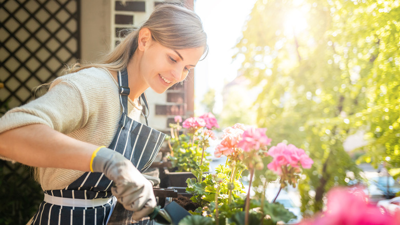 Woman watering flowers