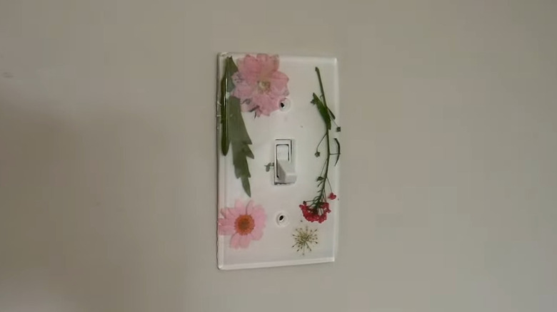 Resin light switch cover on wall