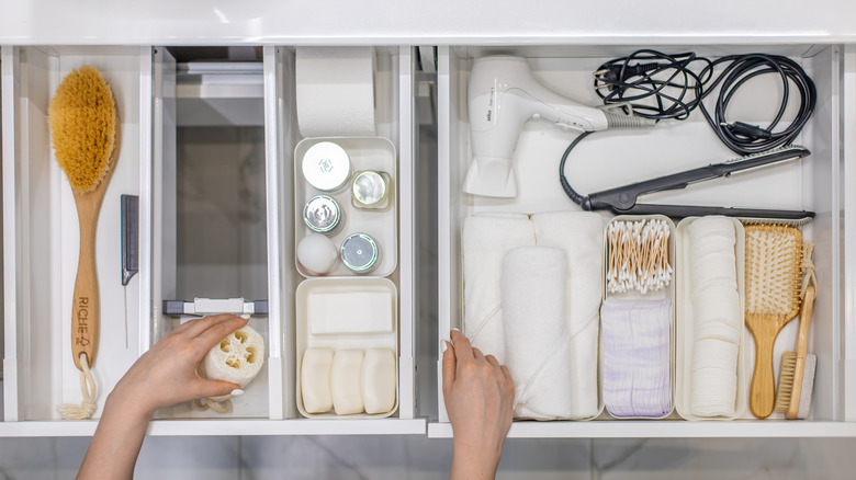 bathroom drawer with brushes