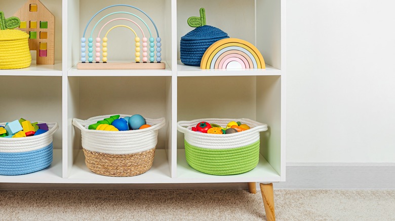 Baskets of toys on shelves