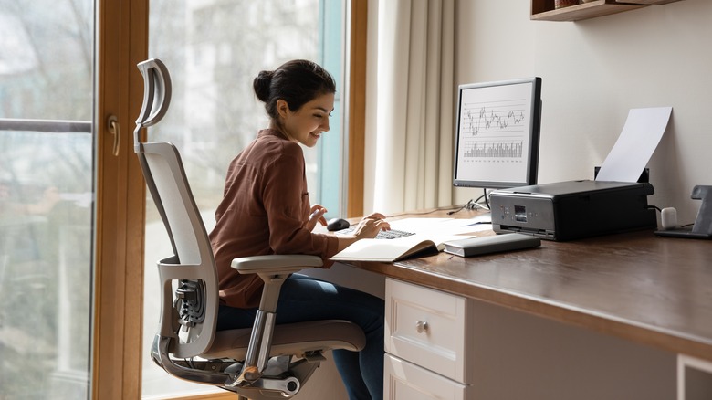 woman smiling in home office