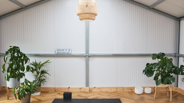 yoga space with wood floors