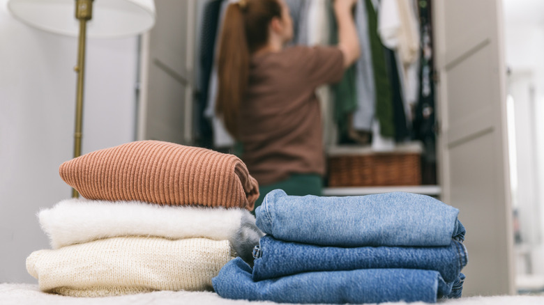 Woman organizing closet