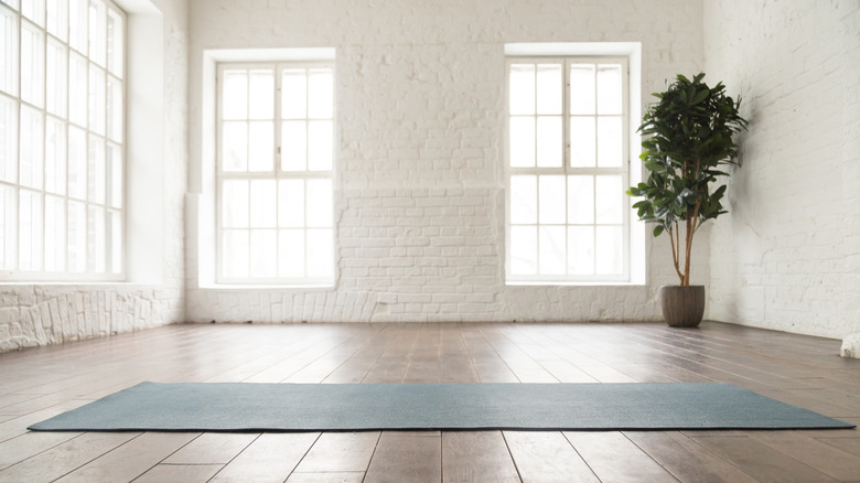 yoga mat in minimalist room