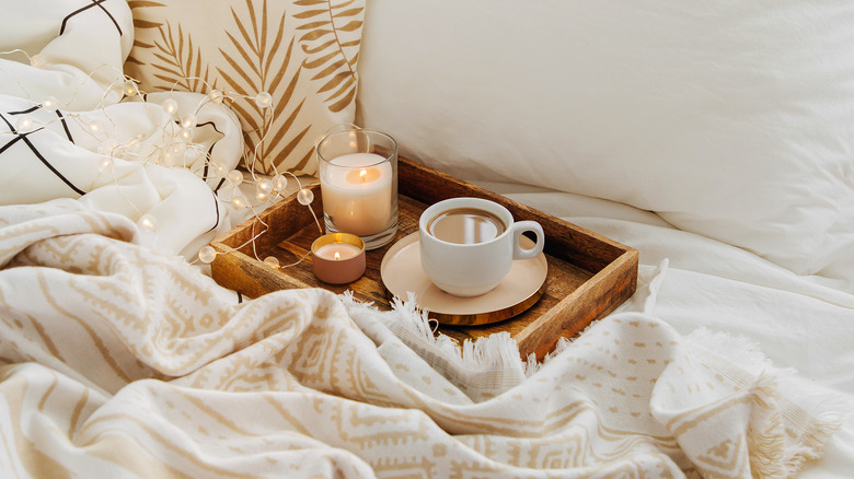 tray with coffee and candles 