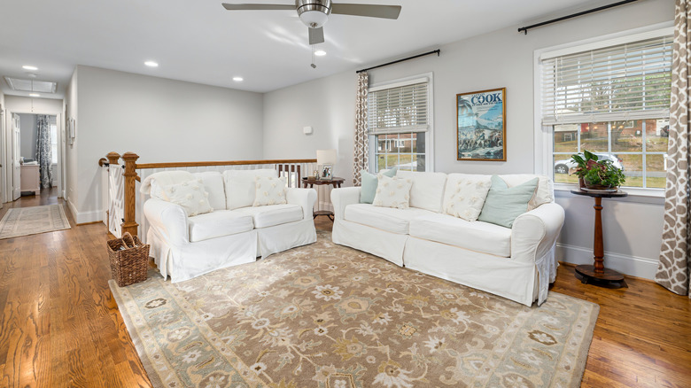 large area rug in neutral room