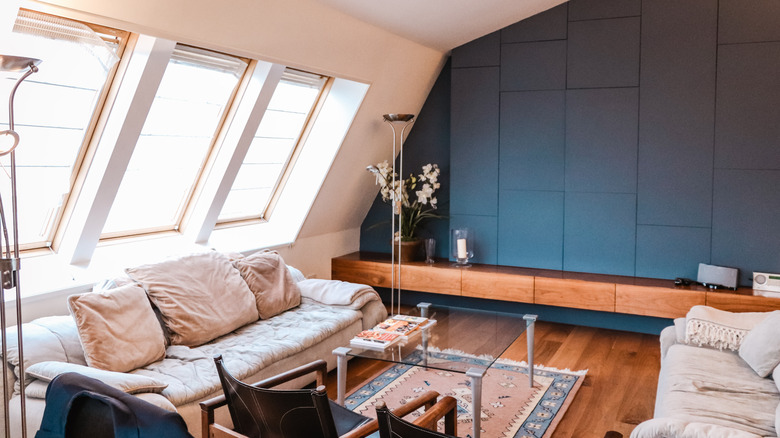 clear glass coffee table in eclectic living room