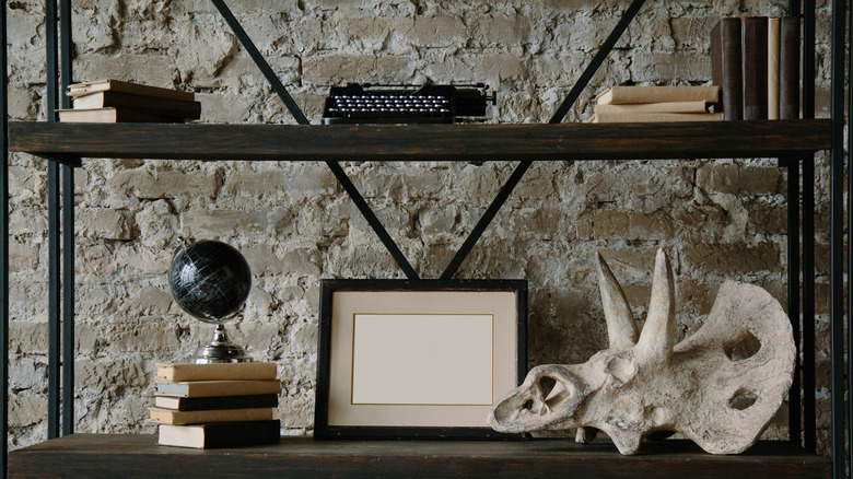 shelves with globe and mementoes