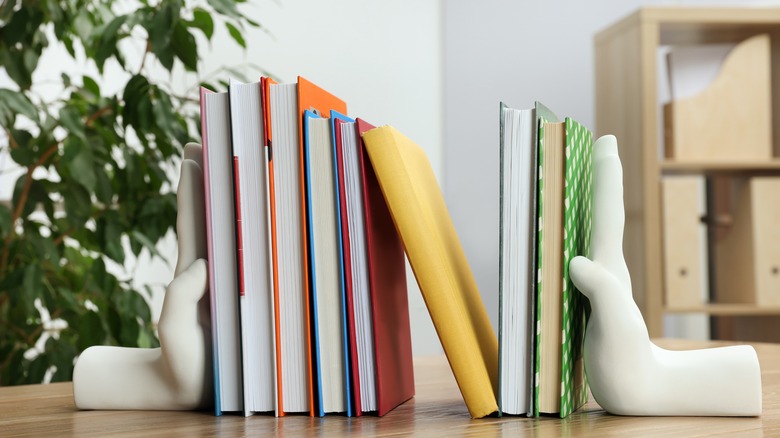 white porcelain hand bookends