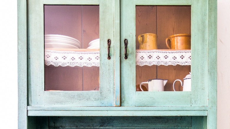 green painted china cabinet