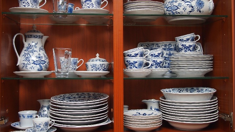 blue and white china in cabinet