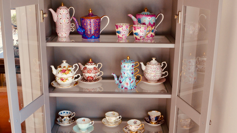group colorful china in cabinet