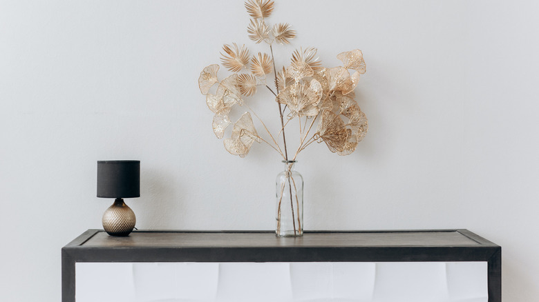 dried flowers on console table