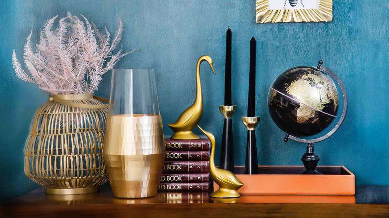 stacked books on console table