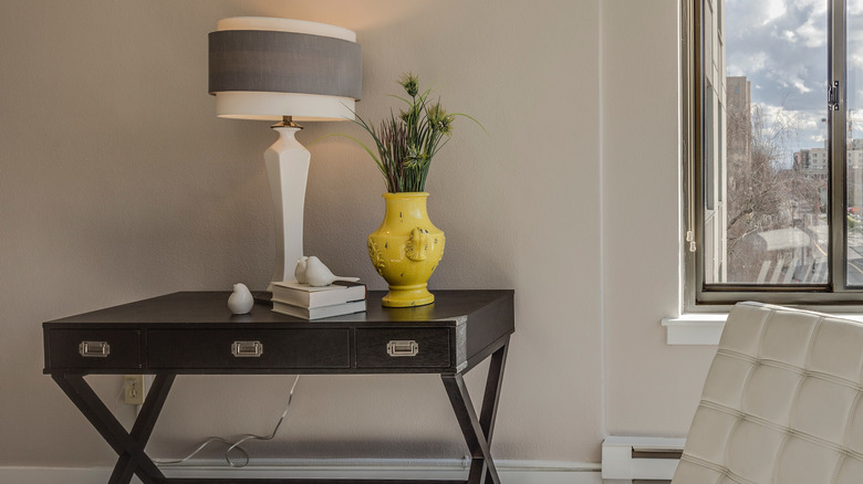 bird statues on console table