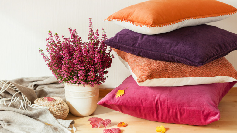 colored throw pillows with flowers