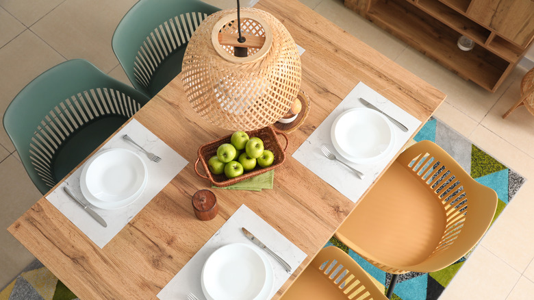 dining room table with apples