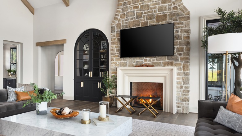 stone fireplace with tv