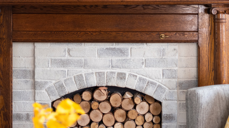 fireplace with logs inside it