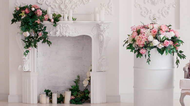 fireplace with flowers inside hearth