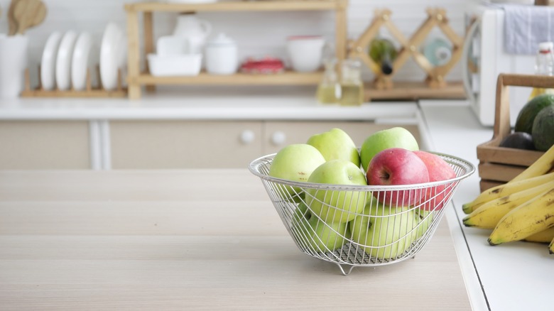 Apples in a metal bowl