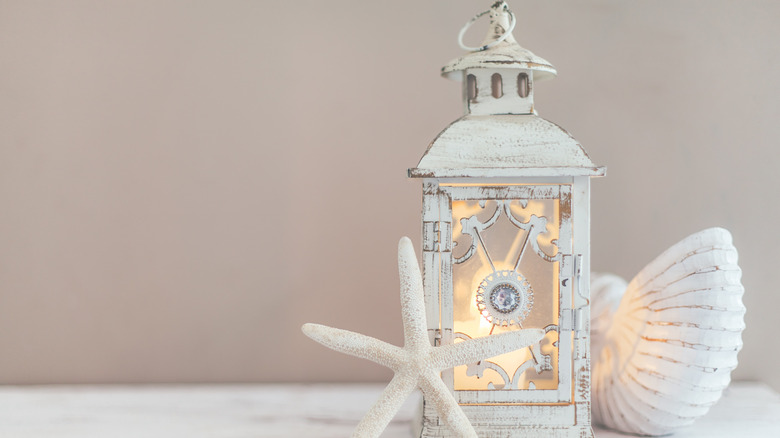 rustic lantern with seashells