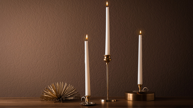 candlesticks on shelf