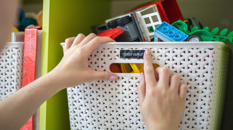 white storage box with Lego