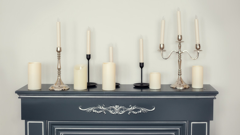 a mantel with candles