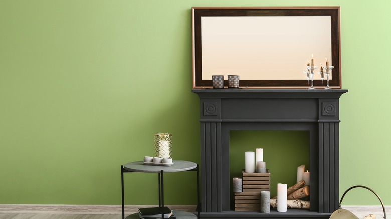 fireplace with mirror over mantel