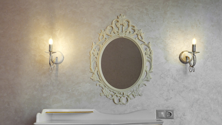 sconces around mirror