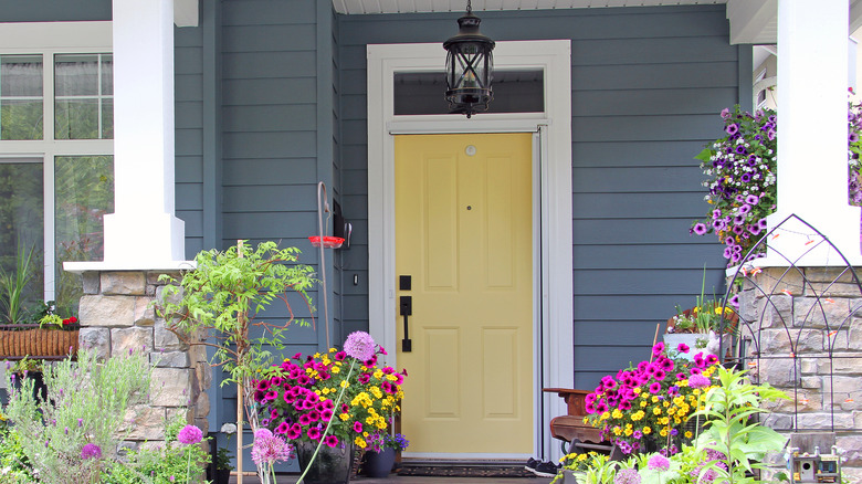 porch flowers and yellow door