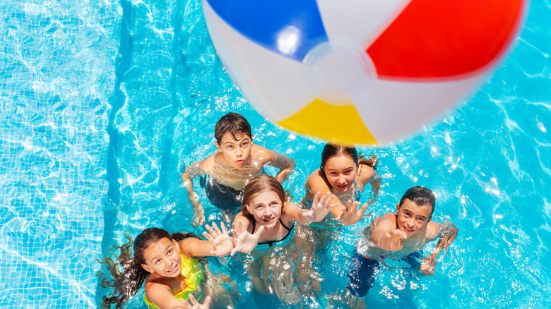 kids playing with beach ball 