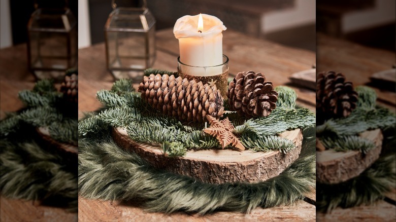 pinecones, garland, and a candle